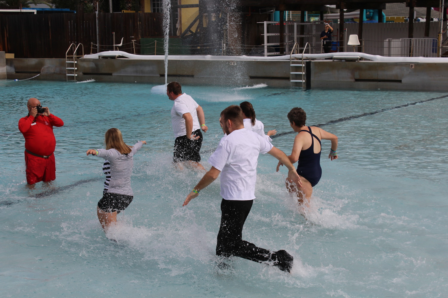 Participants of the Dec. 15 Polar Plunge benefitting Special Olympics Florida celebrate running into the cold water of the wave pool at Adventure Landing’s Shipwreck Island Water Park.