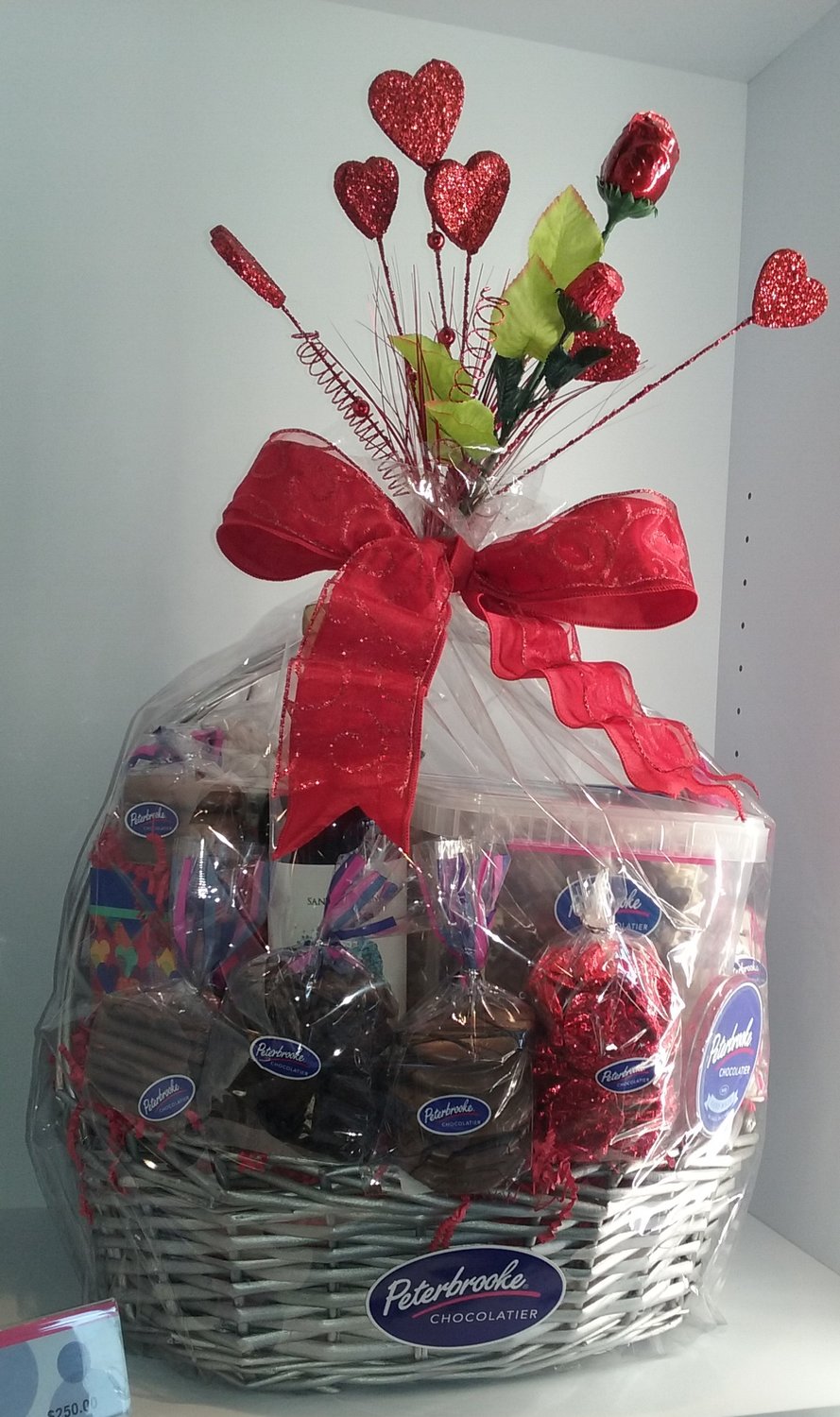Among the many ways Peterbrooke Chocolatier has to express love are treat-filled baskets.
