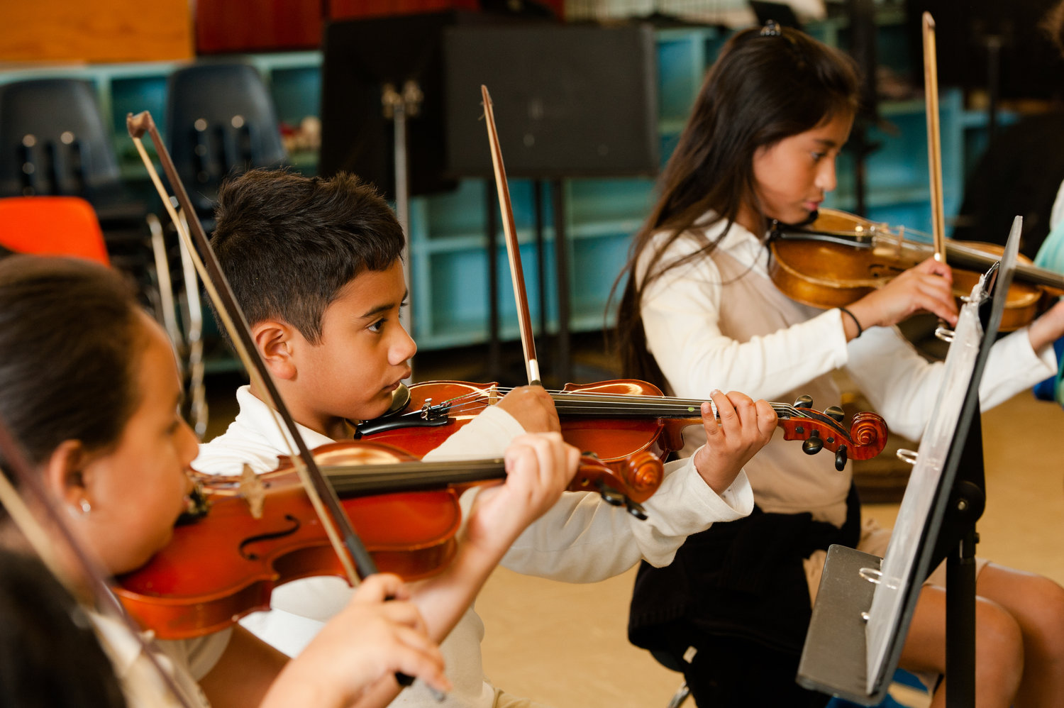 Students perform musical works at Hogan-Spring Glen Elementary.