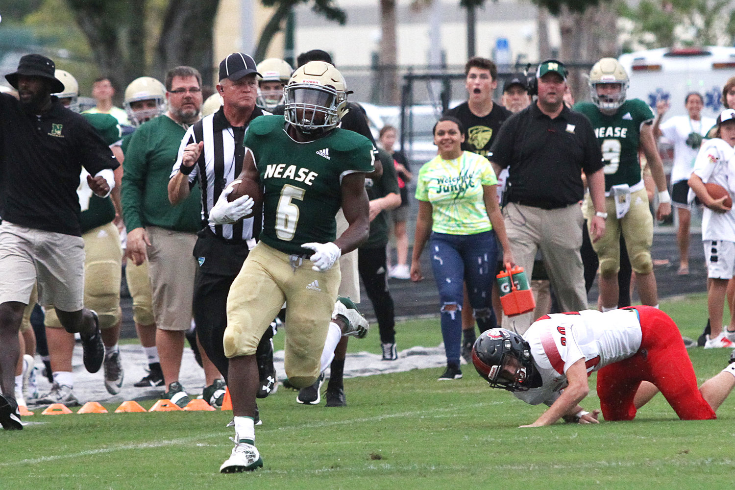 Nease running back Joe Bradshaw (6) takes off for a long touchdown run against Creekside on Aug. 30, 2019.