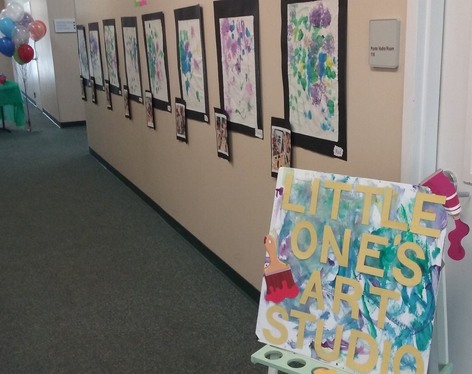 Children’s art decorates a hallway at the Promisetown Preschool Art Show.