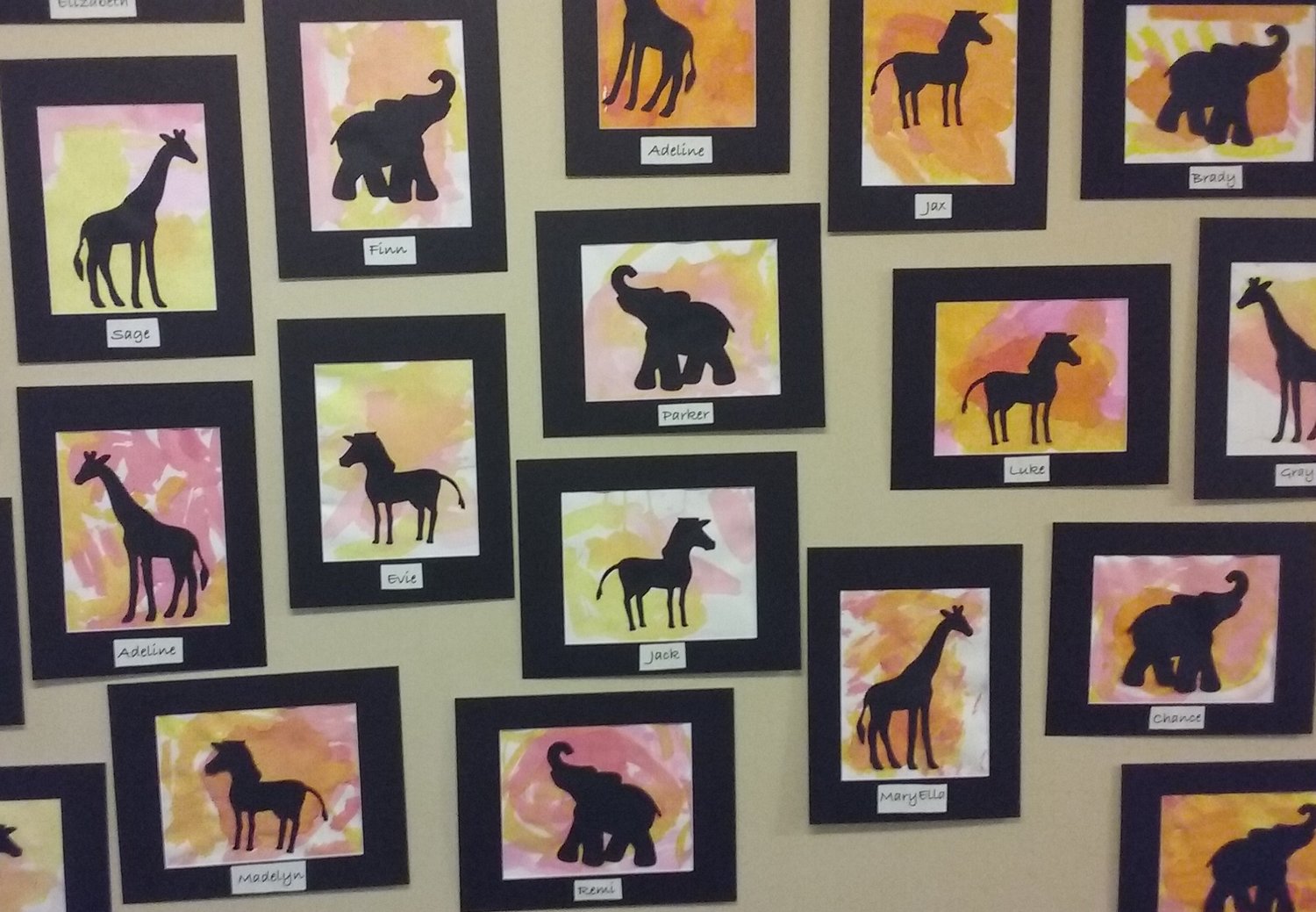 Eye-catching silhouettes occupy one wall at the Promisetown Preschool Art Show.