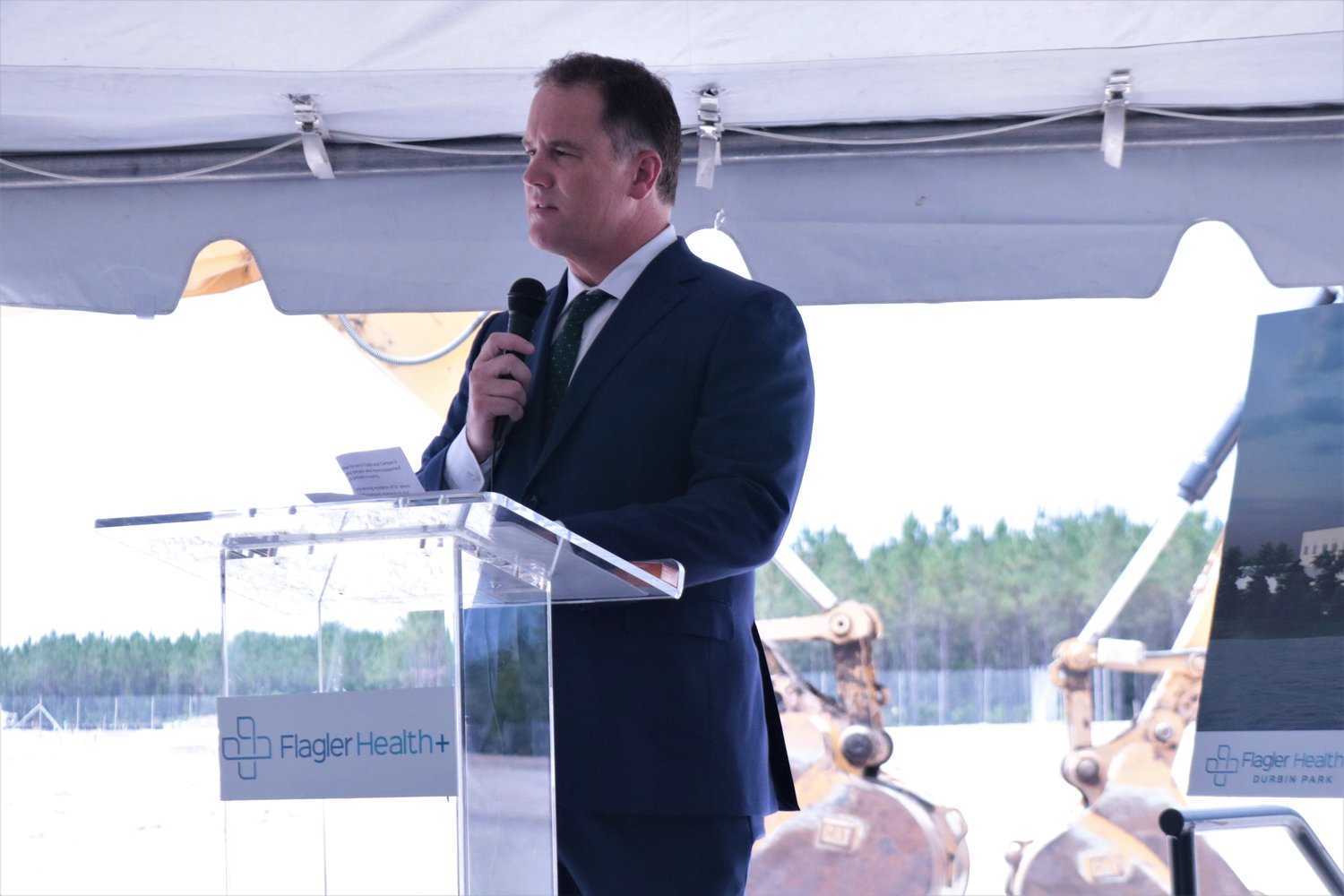 Flagler Health+ President and CEO Jason Barrett speaks at a groundbreaking ceremony for the Durbin Park health-and-wellness campus.