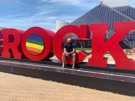 Greg Taylor poses outside the Rock 'n Roll Hall of Fame in Cleveland, Ohio.