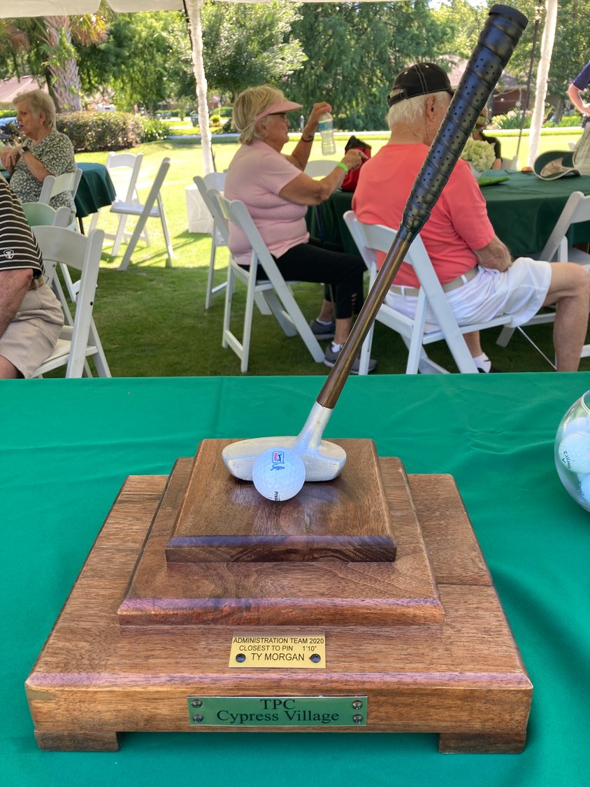 The Putters Tournament trophy was on display at the Cypress Village annual event.