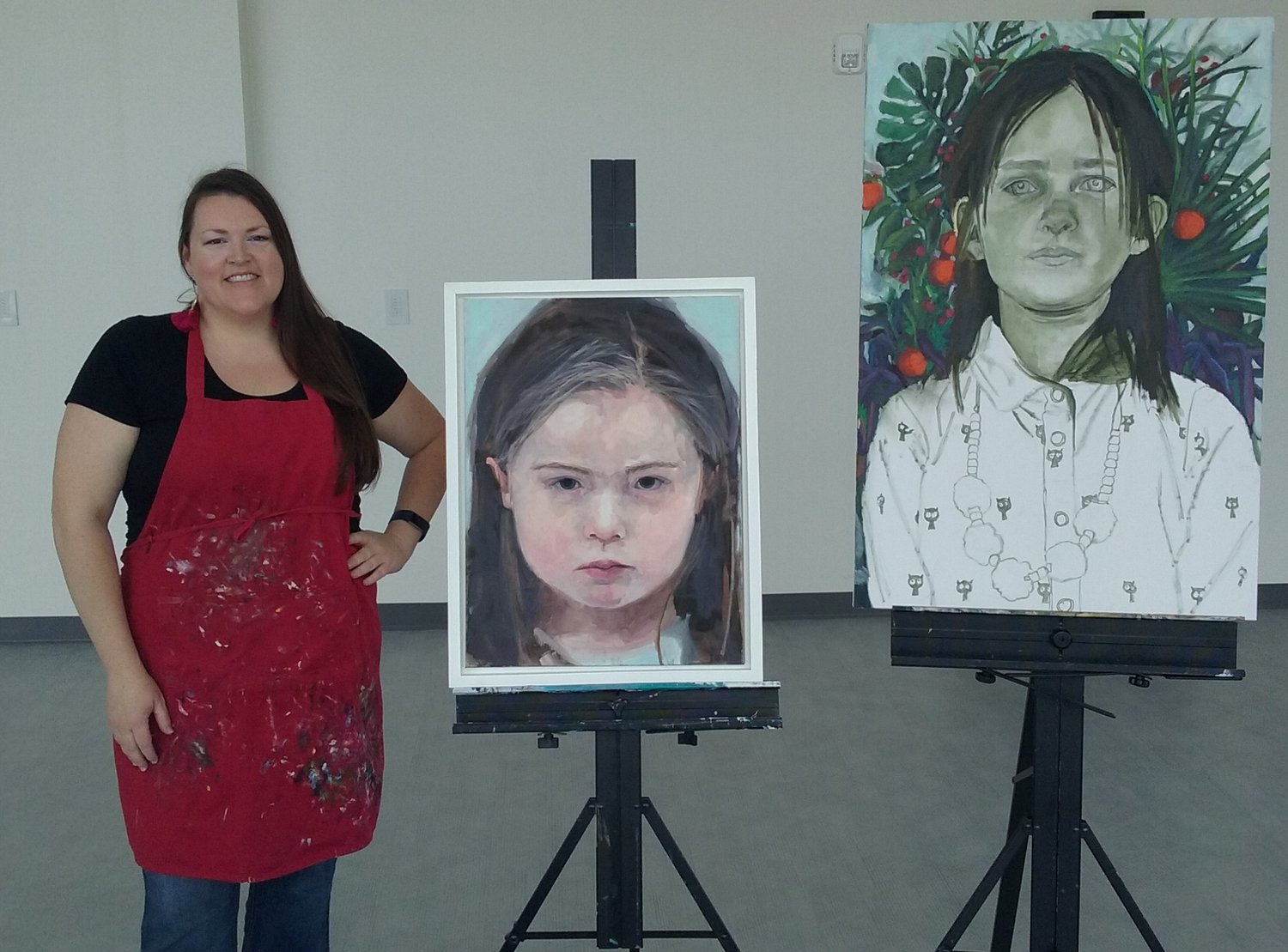 Painter Marisa Yow gave a live painting demonstration during the Cultural Center’s ‘Grand Opening of the Arts’ at the link on Thursday, July 15. The painting at left is finished, and the painting at right is a work in progress.
