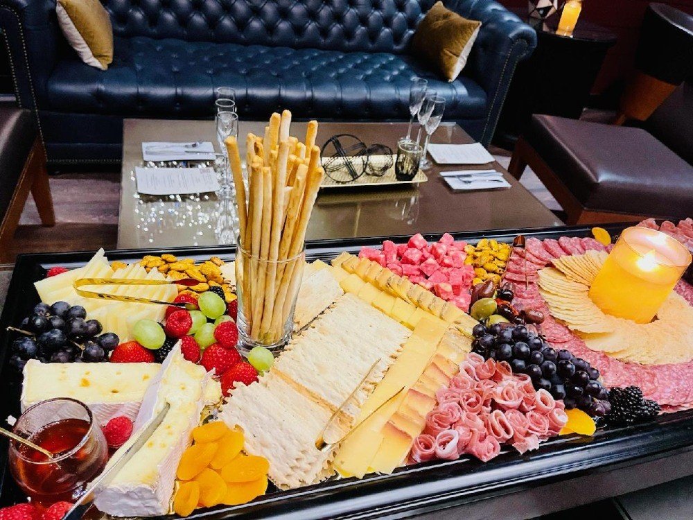 The evening began with a reception featuring a gourmet charcuterie spread.