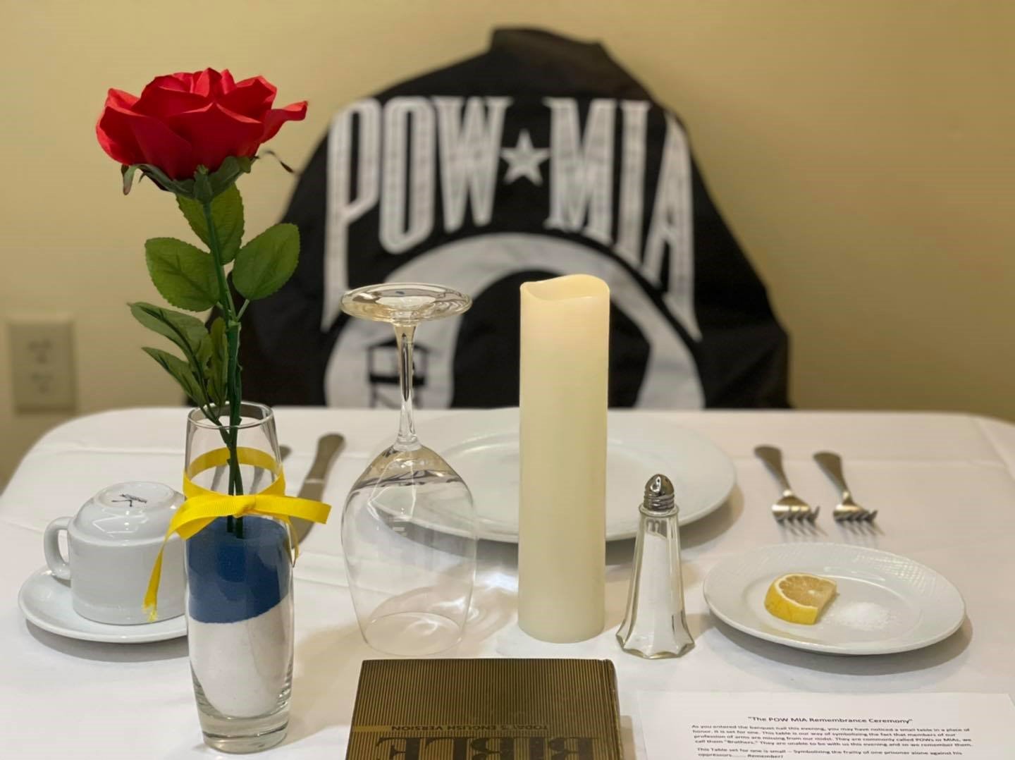 A lone table sits empty, set to remind those in attendance of the soldiers, sailors, Marines and airmen who have never returned from the conflicts America has endured over its history.