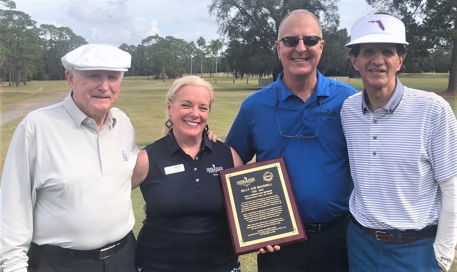 JAGA presents a plaque to Hyde Park and the family of Billy Maxwell. Pictured from left are former PGA TOUR commissioner Deane Beman, Hyde Park owners Melanie and Tommy Bevill, and JAGA president Jeff Adams.