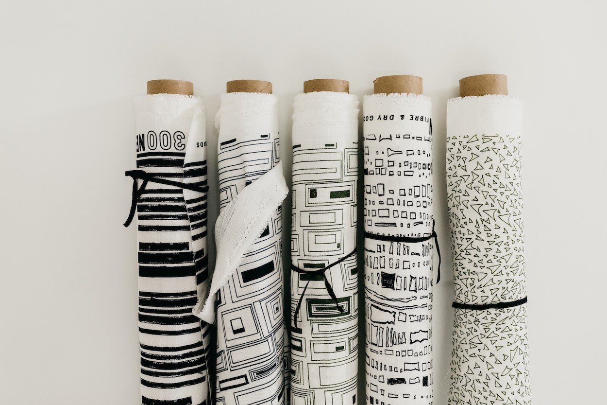 Courtney Krug's fabric is heavy in organic details, architectural lines, high contrast stacking patterns and block print inspiration.