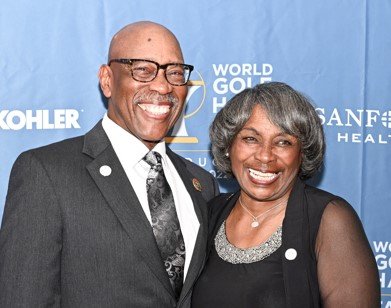 Chris Womack, chairman, president and CEO of Georgia Power, a subsidiary of Southern Company, stands next to Charlie Sifford Award winner Renee Powell.