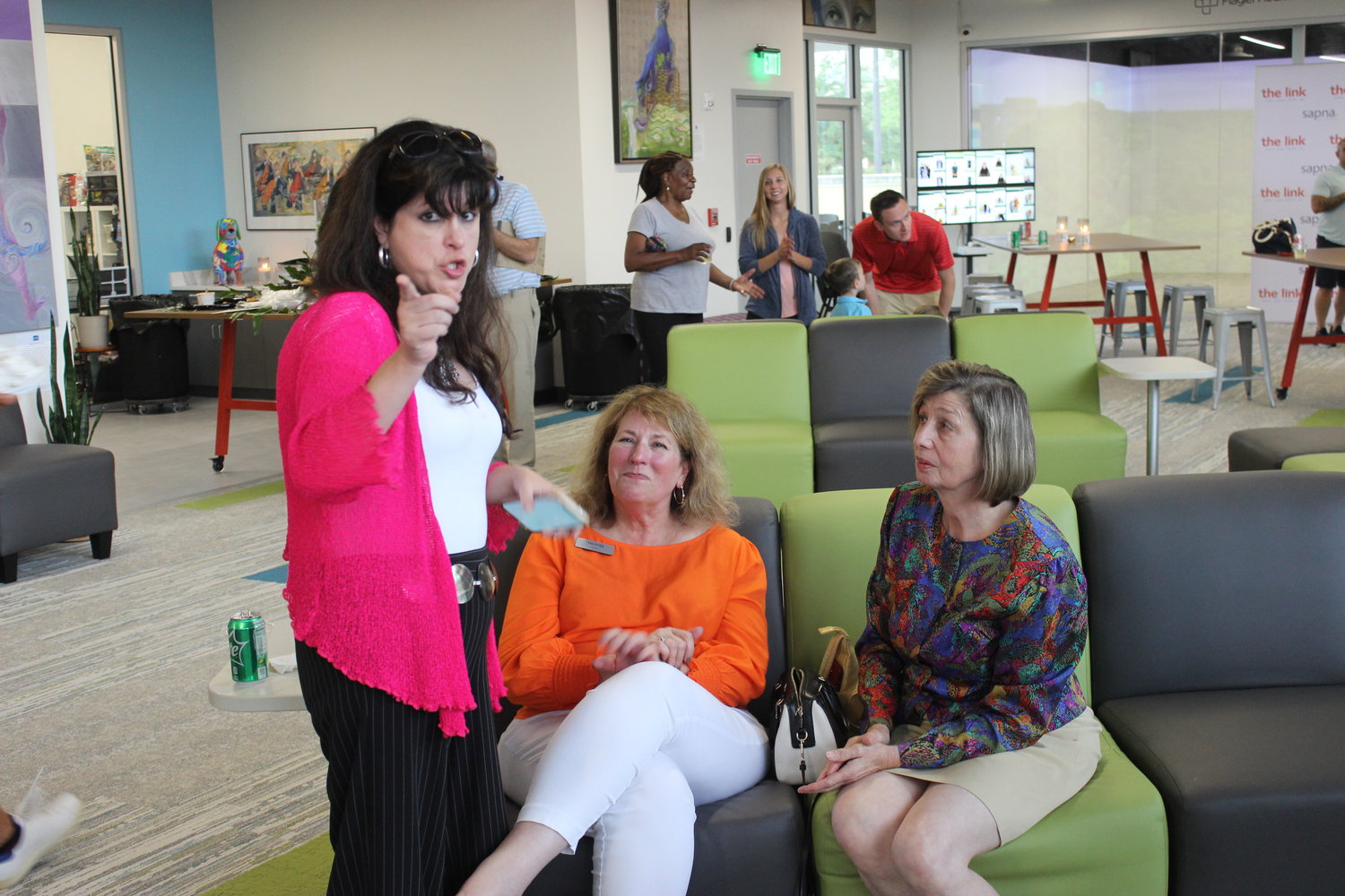 From left: Maria Isabel Montoya-Leonard, Karen Gable and Susanne Schuenke chat during the link’s membership appreciation event.
