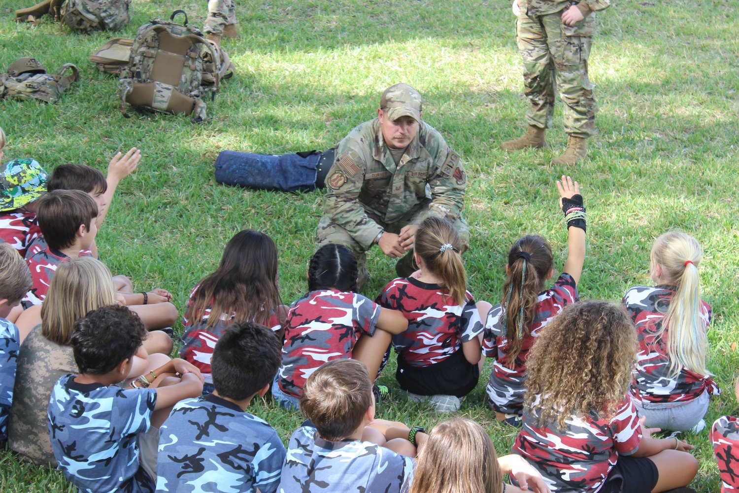 Technical Sgt. Turner of the U.S. Air Force answers students’ questions during The Bolles Lower School Ponte Vedra Beach Campus field day on May 6.