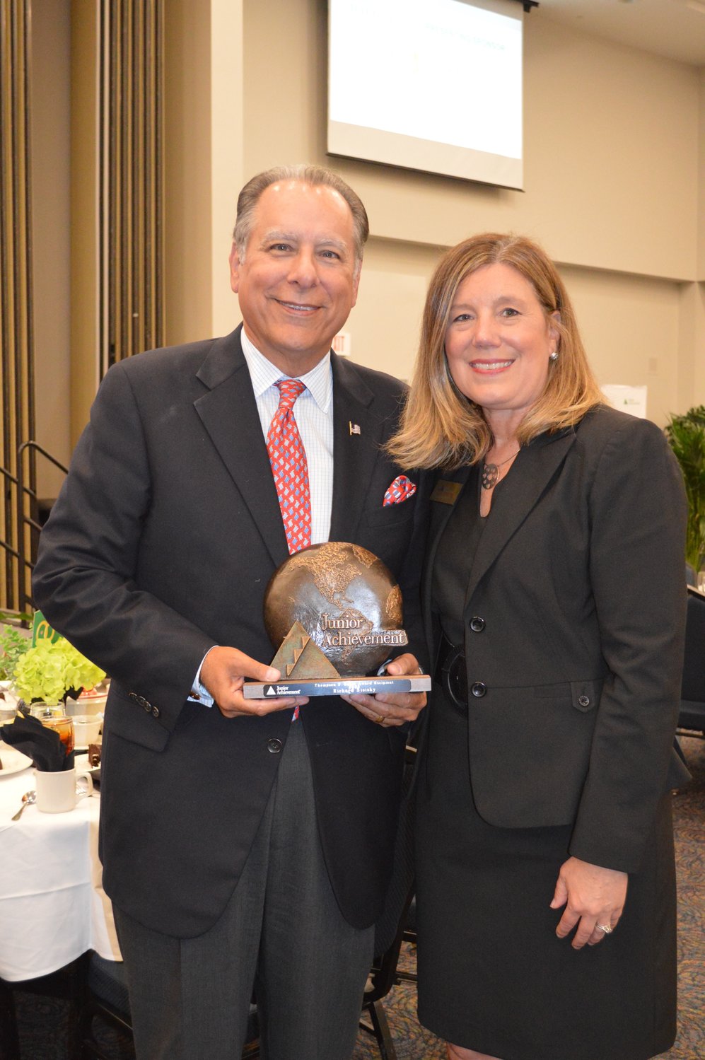 Richard Sisisky and JA of North Florida President Shannon Italia at the Junior Achievement of North Florida’s 2022 Hall of Fame Luncheon. Sisisky was presented the Thompson S. Baker “Solid As A Rock” Award.