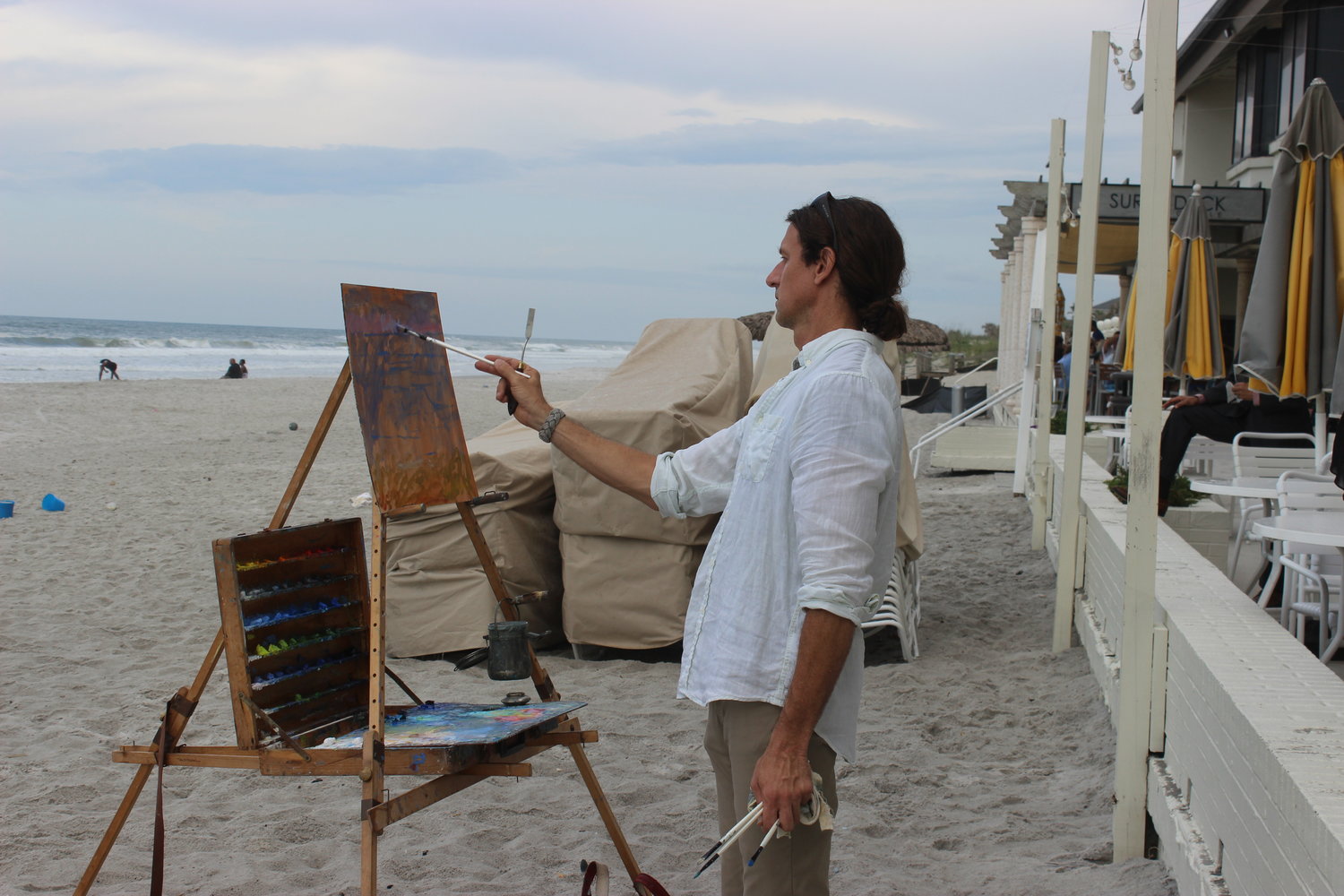 Artist Eugene Quinn gives a live painting demonstration on the beach outside The Surf Club at the Ponte Vedra Inn & Club during Beaches, A Celebration of the Arts on Sunday, May 15.