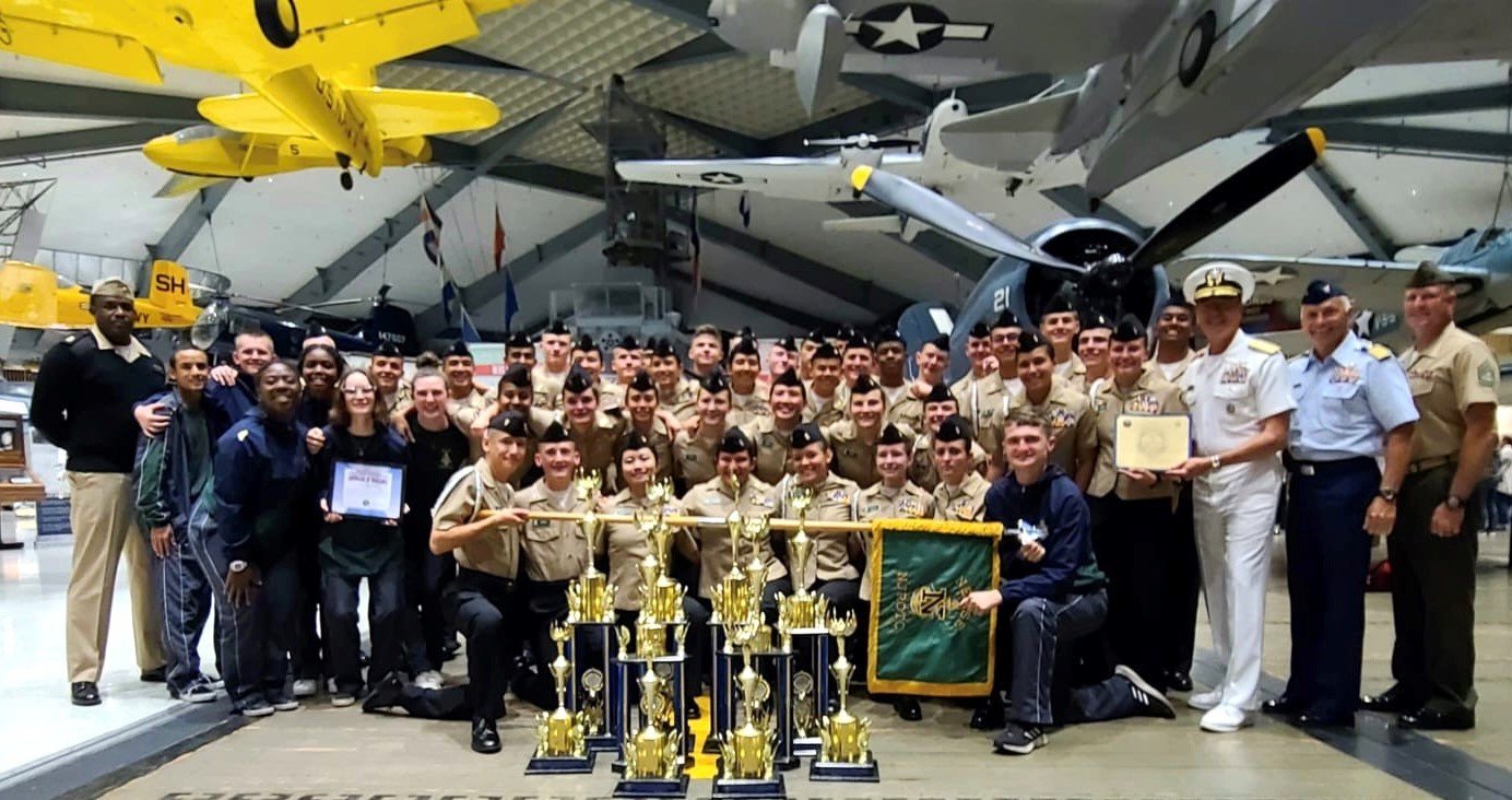 Nease’s drill team celebrates with RADM Peter Garvin following the Navy National Academic, Athletic and Drill Championships in Pensacola.