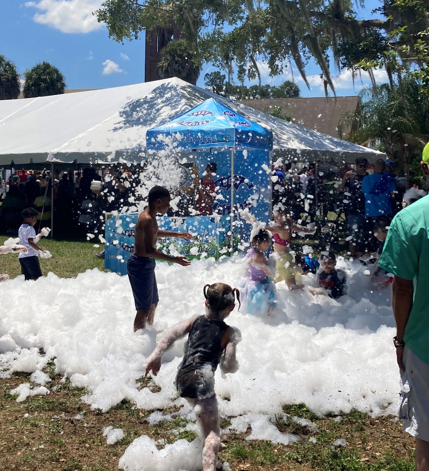 Kids have lots of fun at a sudsy corner of the Palatka Blue Crab Festival.