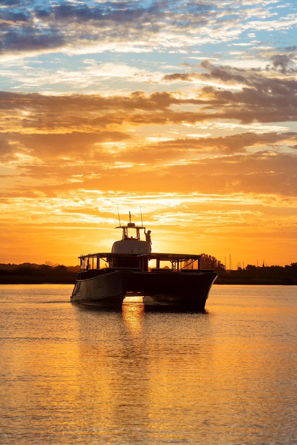 It’s another golden morning in Northeast Florida as Sabrage cruises placid waters.