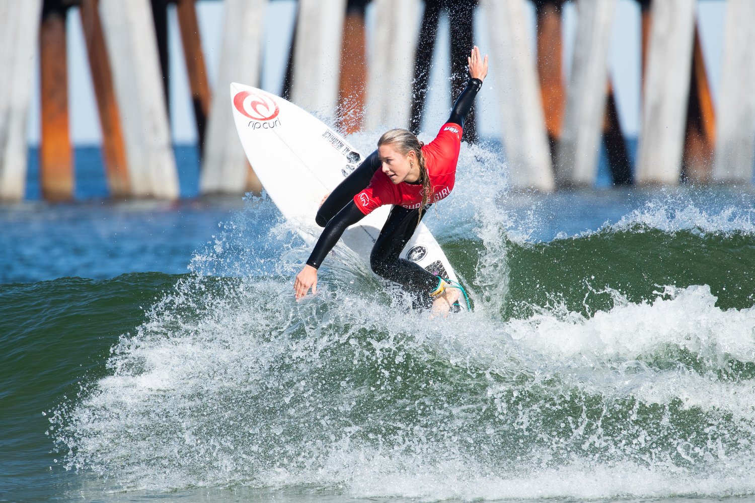 Super Girl Jacksonville defending champion Alyssa Spencer demonstrates her surf skills during the 2021 competition in Jacksonville Beach.