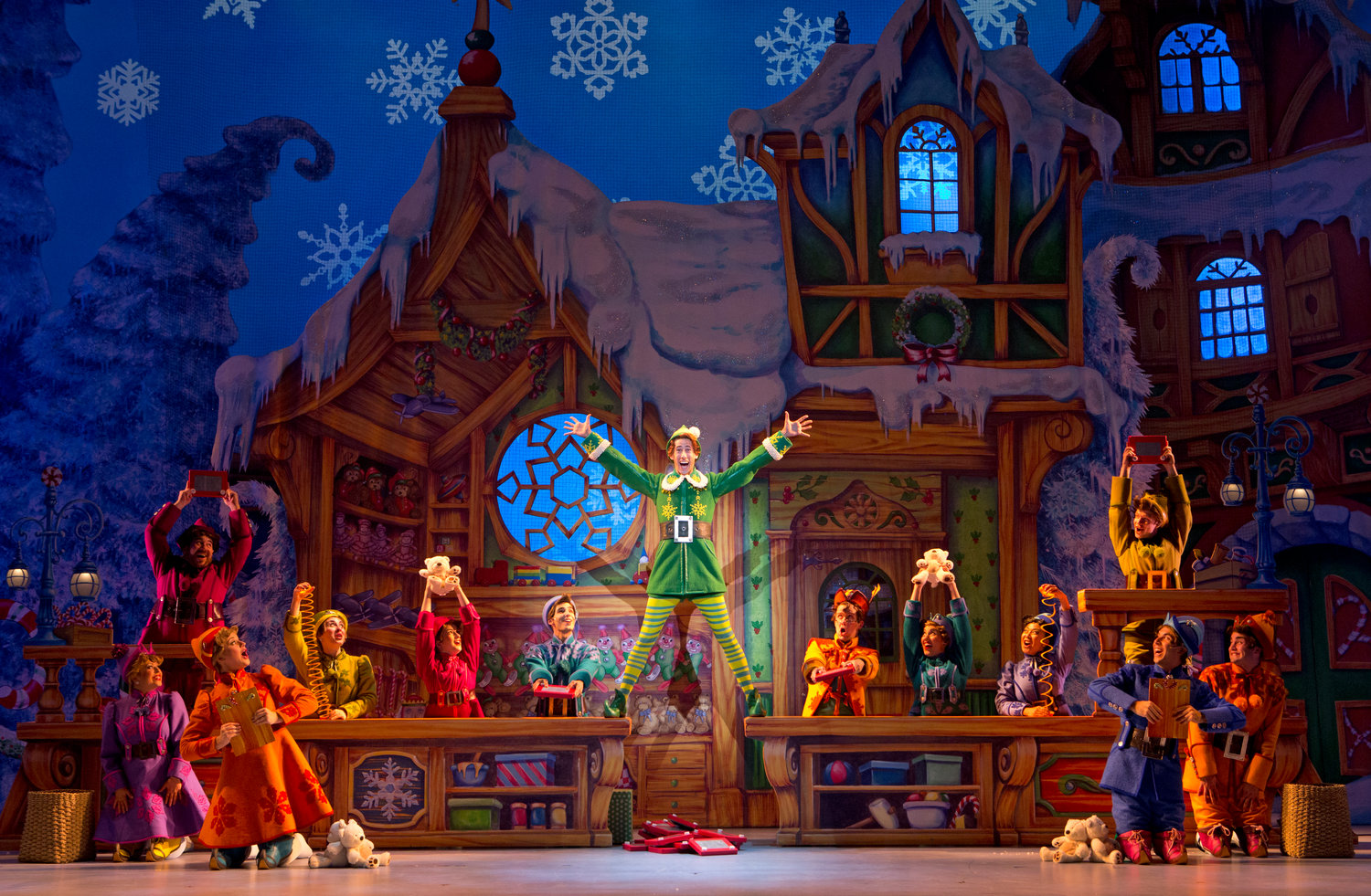Buddy (Cody Garcia) and the elves in Christmastown.