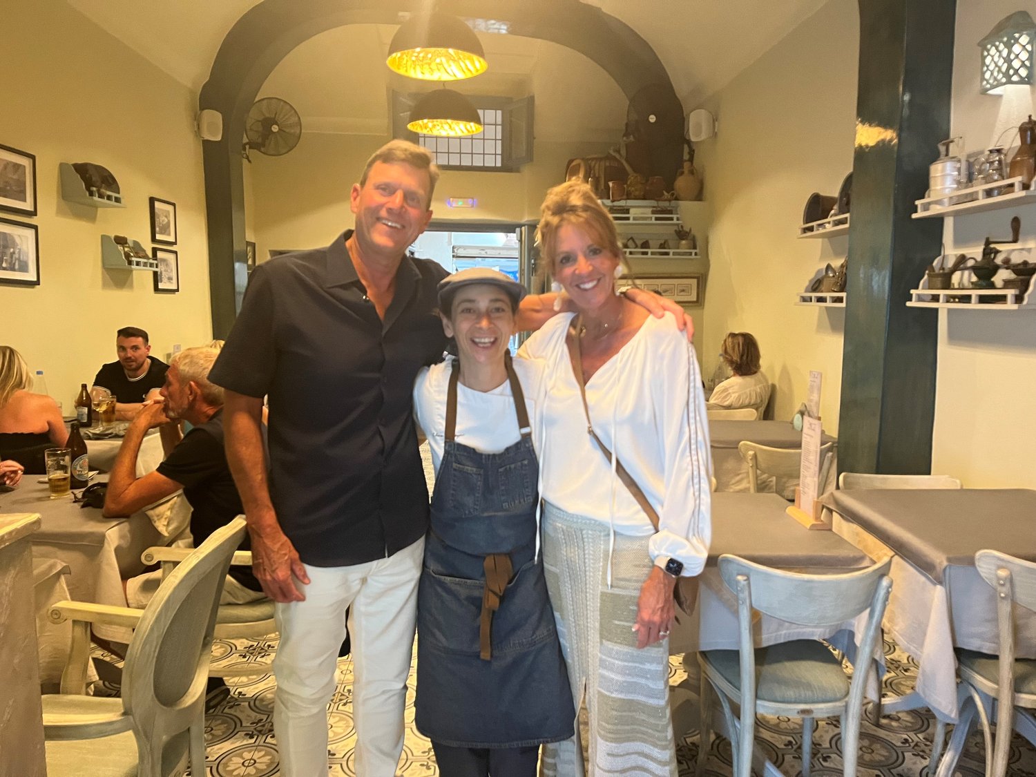 With the owner of the Nikolas Restaurant in Santorini.