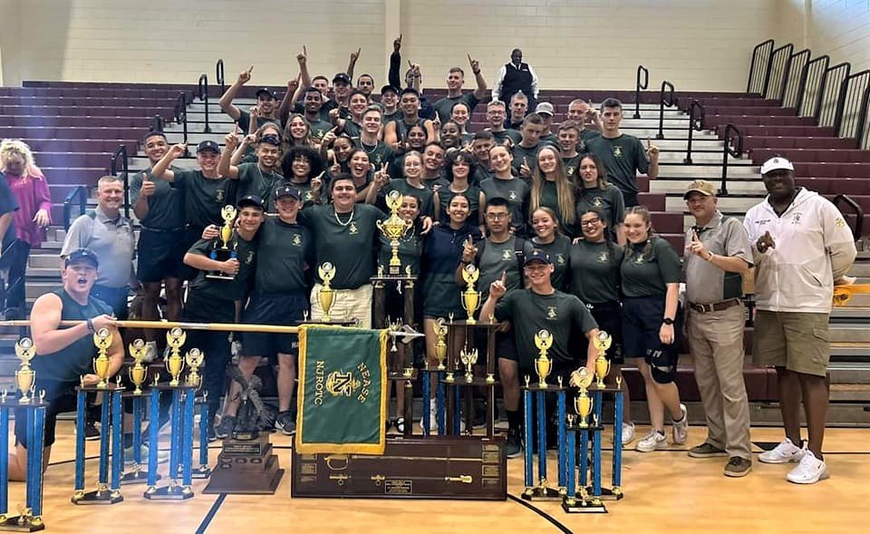 The Nease drill team celebrates their ninth consecutive overall win of the annual Area 12 Drill Championship.