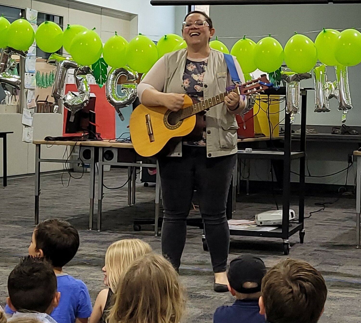 Candice Sirak performs a musical piece for students at Osceola Elementary School on May 19.