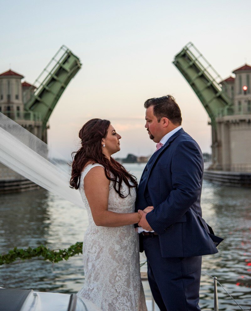 With romantic scenery in the background, a couple ties the knot aboard one of St. Augustine Sailing’s boats.