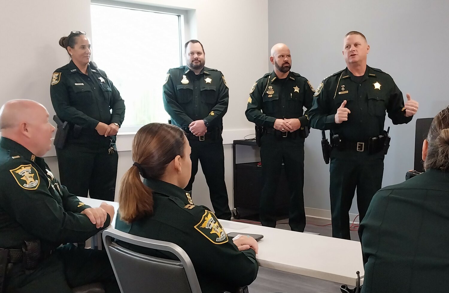 Sheriff Robert Hardwick, right, speaks at department’s the first graduation for K9s For Warriors. Pictured from left are: Deputy Laura Welty, Lt. Keith Melton, Sgt. Michael Clark and Hardwick.