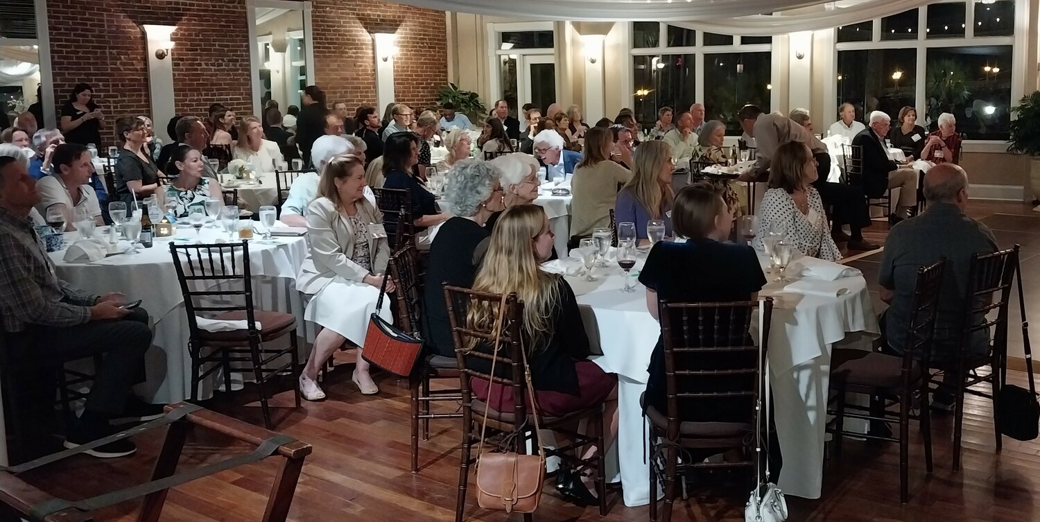 Attendees at the recent Volunteer and Donor Appreciation Dinner for Habitat for Humanity of St. Augustine/St. Johns County listen to a speaker during the 30th anniversary celebration.